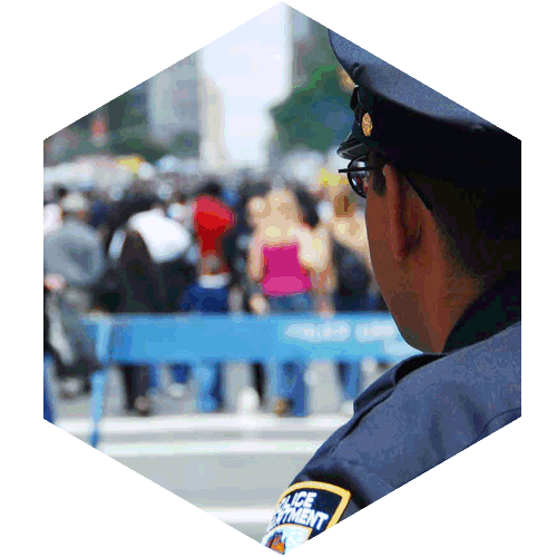 Police Officer Watching a Crowd of People.