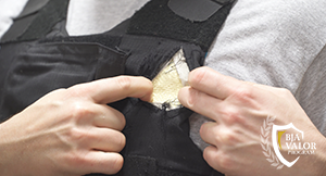 Episode 3 Thumbnail, person adjusting badge.